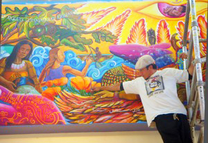 Arturo Avila, working on the Berkeley City College "Night" mural, 5th Floor Student Lounge. Photo: Juana Alicia ©2008